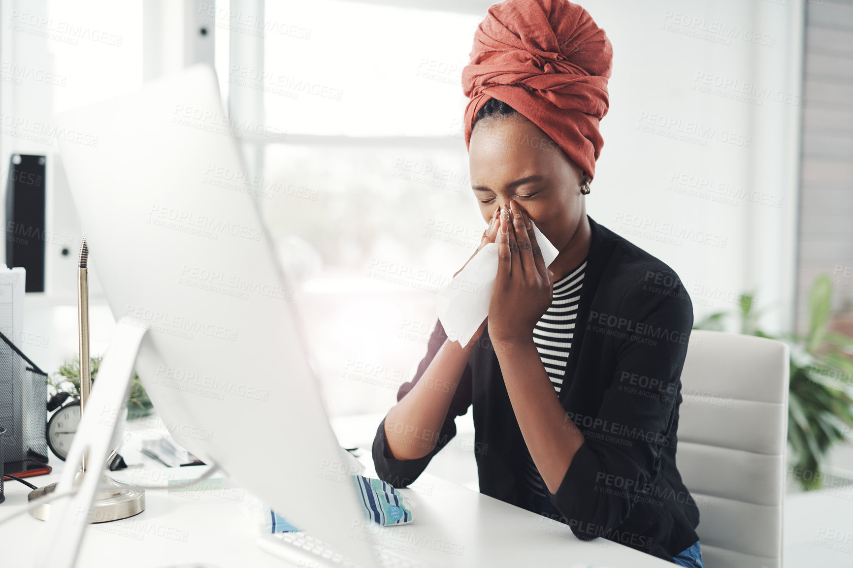 Buy stock photo Black woman, computer and sick in office with blowing nose and tissue with virus and allergy. Illness, technology and ux upgrade on internet with hygiene, bacteria and sneeze at desk with cold