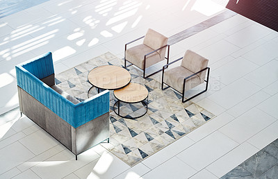 Buy stock photo High angle shot of an empty table and chairs in a workplace lobby