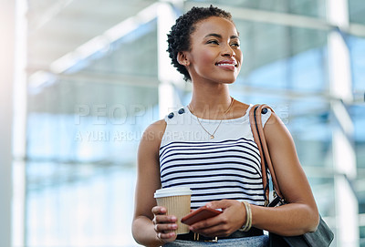 Buy stock photo Cropped shot of an attractive young businesswoman looking thoughtful while standing in a modern office