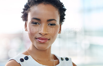 Buy stock photo Cropped portrait of an attractive young businesswoman standing in a modern office