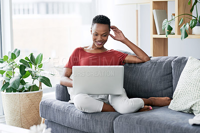 Buy stock photo Happy, black woman and relax with laptop on a sofa, comfortable and chilling on the weekend. Streaming, smile and African female person online for internet, search and subscription in a living room