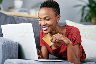 Buy stock photo Laptop, credit card and black woman relax on a sofa for online shopping, e commerce and membership. Banking, credit score and female African person happy with payment, booking or customer experience