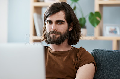 Buy stock photo Laptop, research and man in home typing email for connectivity, contact and networking for startup business, Computer, communication and male freelance copywriter in living room with remote work.