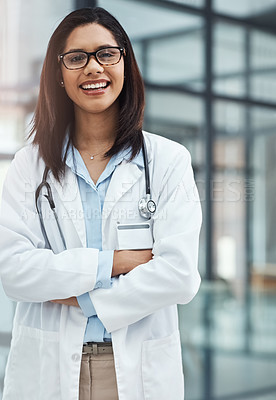 Buy stock photo Portrait of a confident young doctor working in a modern hospital