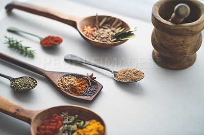 Buy stock photo Shot of an assortment of spices