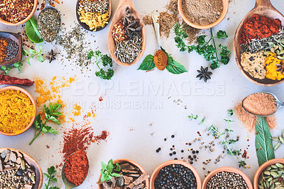 Buy stock photo Spices, organic and selection of herbs seasoning on studio background for cooking and top view. Utensils, fresh condiments or flavor ingredients with curry leaves, masala powder and ground pepper