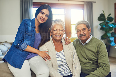 Buy stock photo Family, relax and happy in home for portrait, weekend visit or support with hug on sofa. Elderly couple, Brazil woman or smile in living room for retirement care, relationship development and reunion