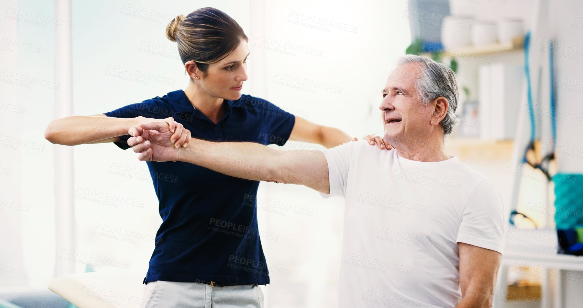 Buy stock photo Physiotherapy, consultant and exercise with a woman physio and senior man patient in a clinic for rehabilitation. Fitness, healthcare and wellness with a mature male in session with a physiotherapist