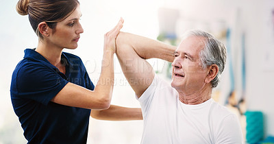 Buy stock photo Physical therapy, physiotherapist consulting senior man for muscle, elbow and stretching exercise, exam or check. Physiotherapy, chiropractor and healthcare rehabilitation support for elderly client