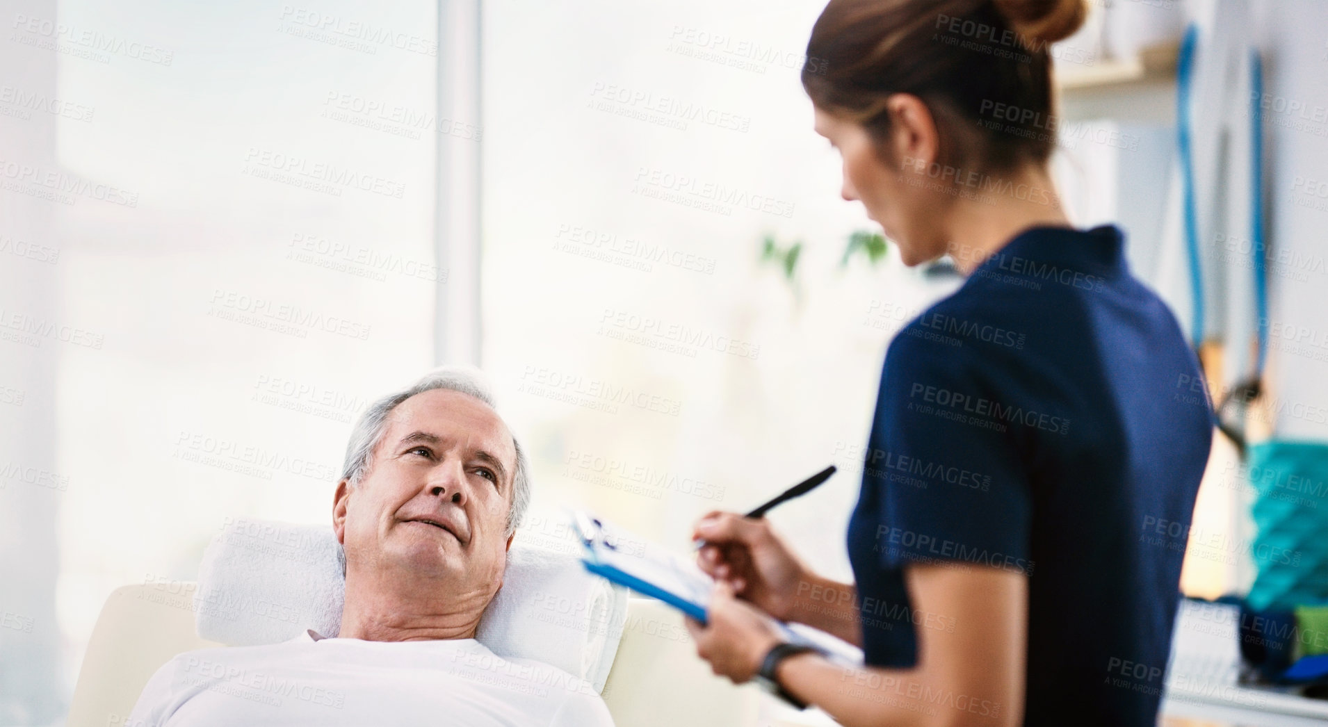 Buy stock photo Senior man, healthcare worker and patient rehabilitation while writing on a clipboard for physiotherapy assessment with a doctor. Woman chiropractor with male for physical therapy, physio and help 