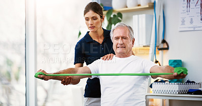 Buy stock photo Physiotherapy, senior man and doctor exercise, resistance band and workout for muscle rehabilitation in a clinic.  Physiotherapist, elderly patient and training, stretching muscles and body fitness