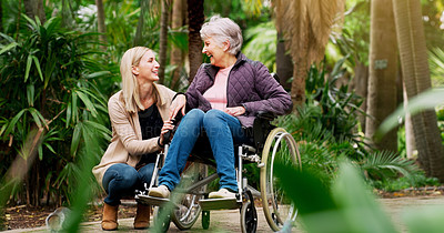 Buy stock photo Smile, woman and senior mother in wheelchair at park for conversation, retirement and help for support. Daughter, mom and person with a disability in garden for love, laugh and happy family bonding