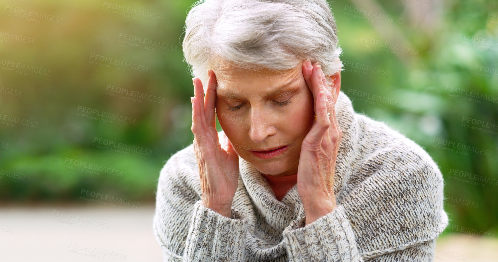 Buy stock photo Headache, stress and senior woman in outdoor park for anxiety, burnout or depression in retirement home. and elderly female person with migraine in backyard garden for pain, sore head or fatigue