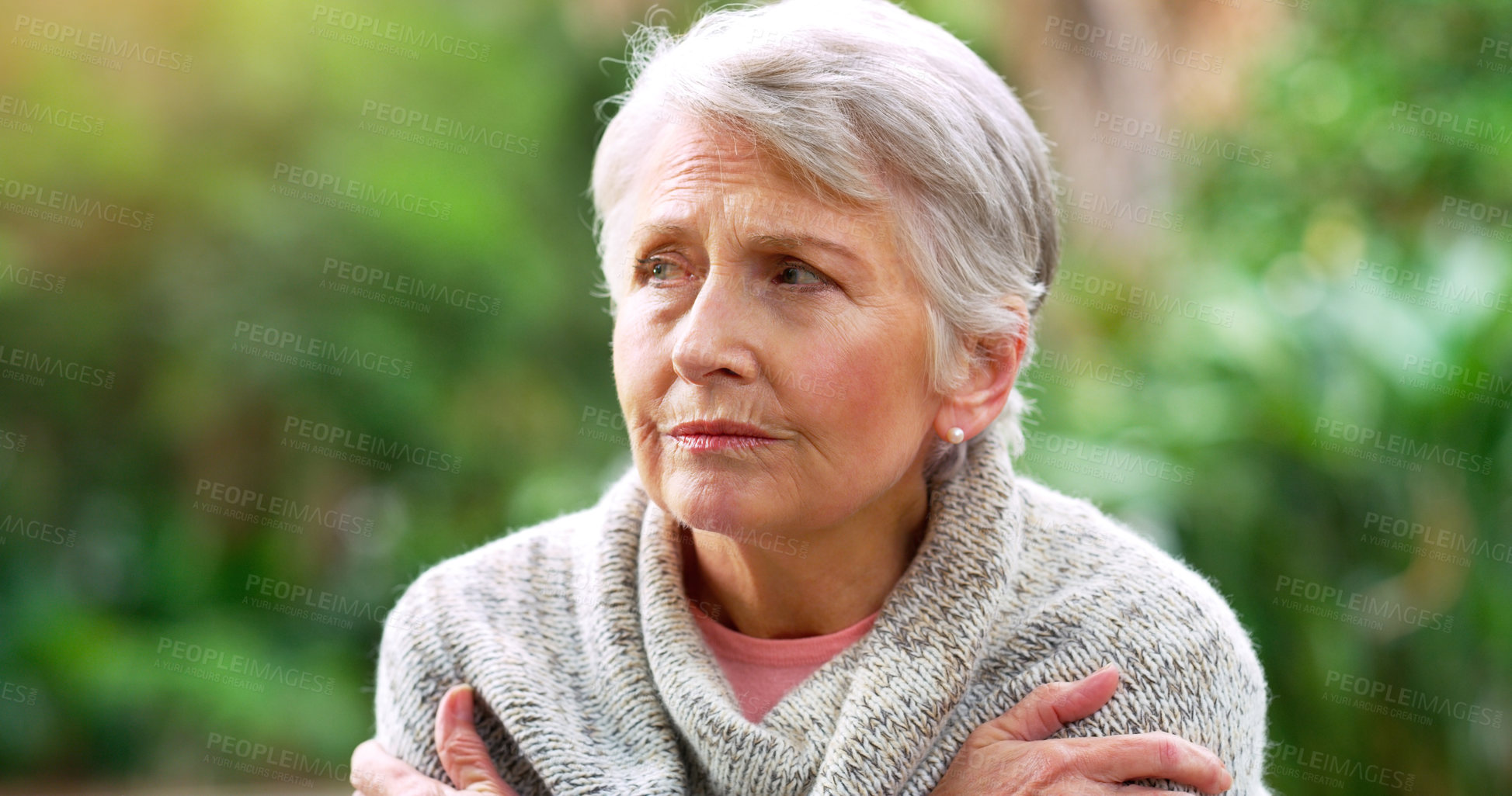 Buy stock photo Senior woman, thinking and lonely in park for retirement, pension and anxiety for old age in nursing home. Grandmother, alone and unhappy in nature for mental health, dementia and Alzheimer.