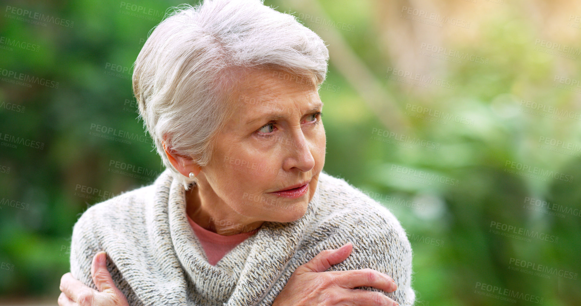 Buy stock photo Depression, sad and senior woman in outdoor park for mourning, anxiety or mental health in retirement home. Crying, memory and elderly person with dementia for confused, worry and feeling lonely