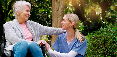 Buy stock photo Wheelchair, senior woman and nurse talk at park for retirement, bonding or wellness rehabilitation. People, smile and happy together in nature for healthcare, disability or support and mobility aid