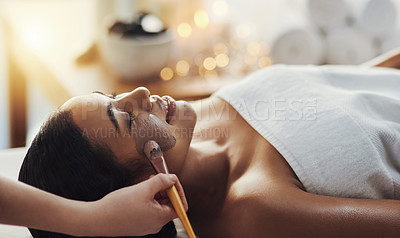 Buy stock photo Closeup shot of a woman getting an exfoliating massage at a spa