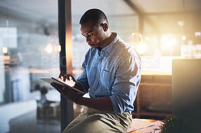 Buy stock photo Dark, tablet and black man in office for business, connectivity and research for webdesign. Programmer, schedule and reading on tech for software information, company website update or online review