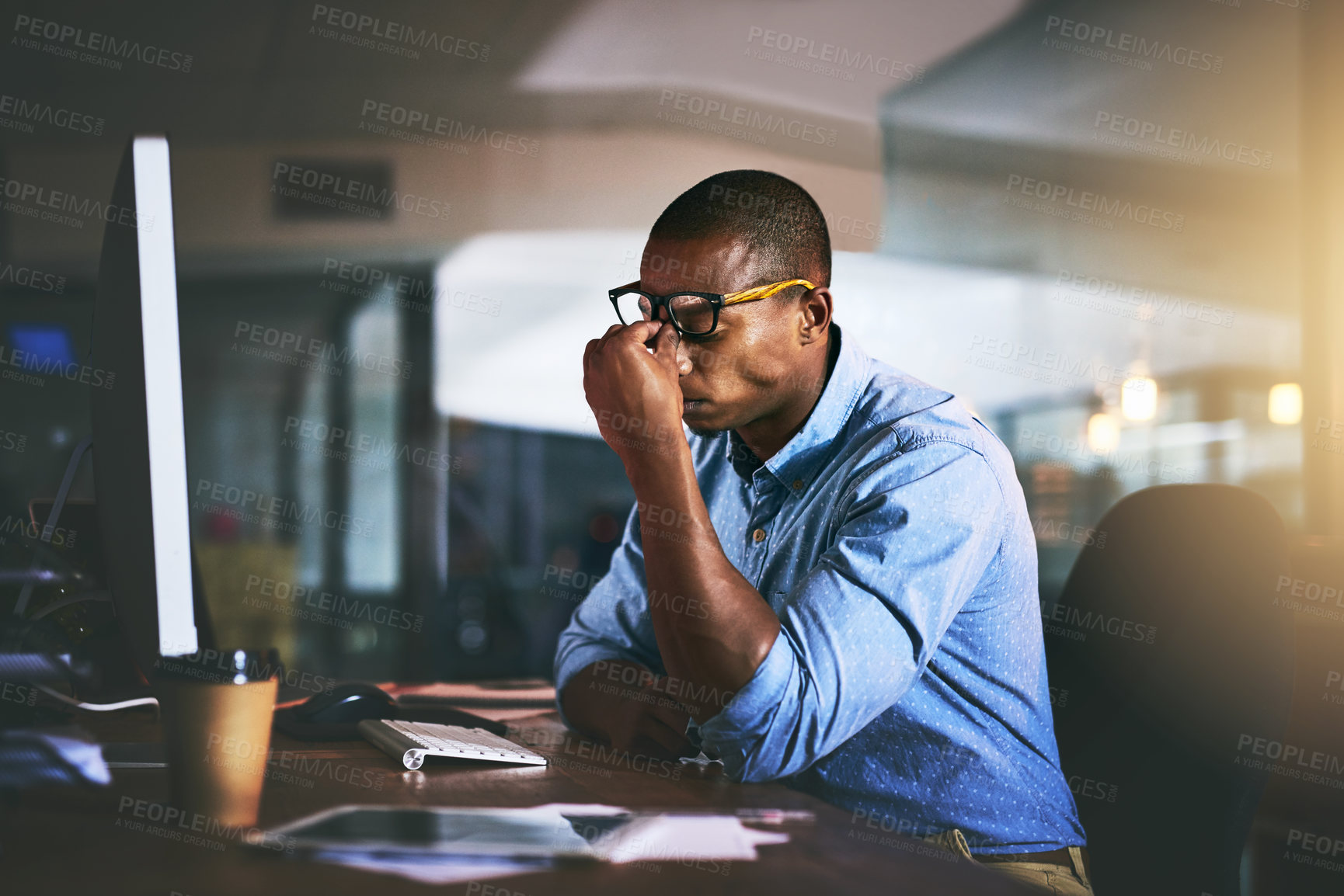 Buy stock photo Black business man, stress and headache in night, office and fatigue by computer for project deadline. African businessman, burnout or anxiety in workplace by pc, web design startup and mental health