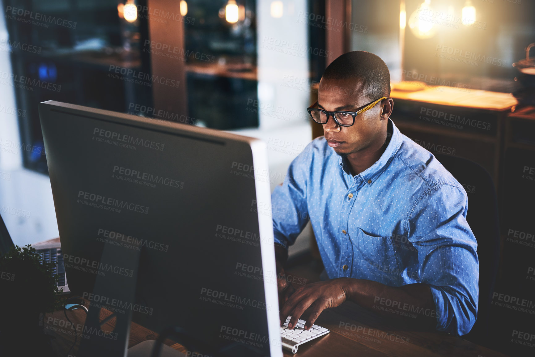 Buy stock photo Business man, night working and computer with dark office typing and project web research. African male worker, technology and coding for IT programmer app for company with tech and internet
