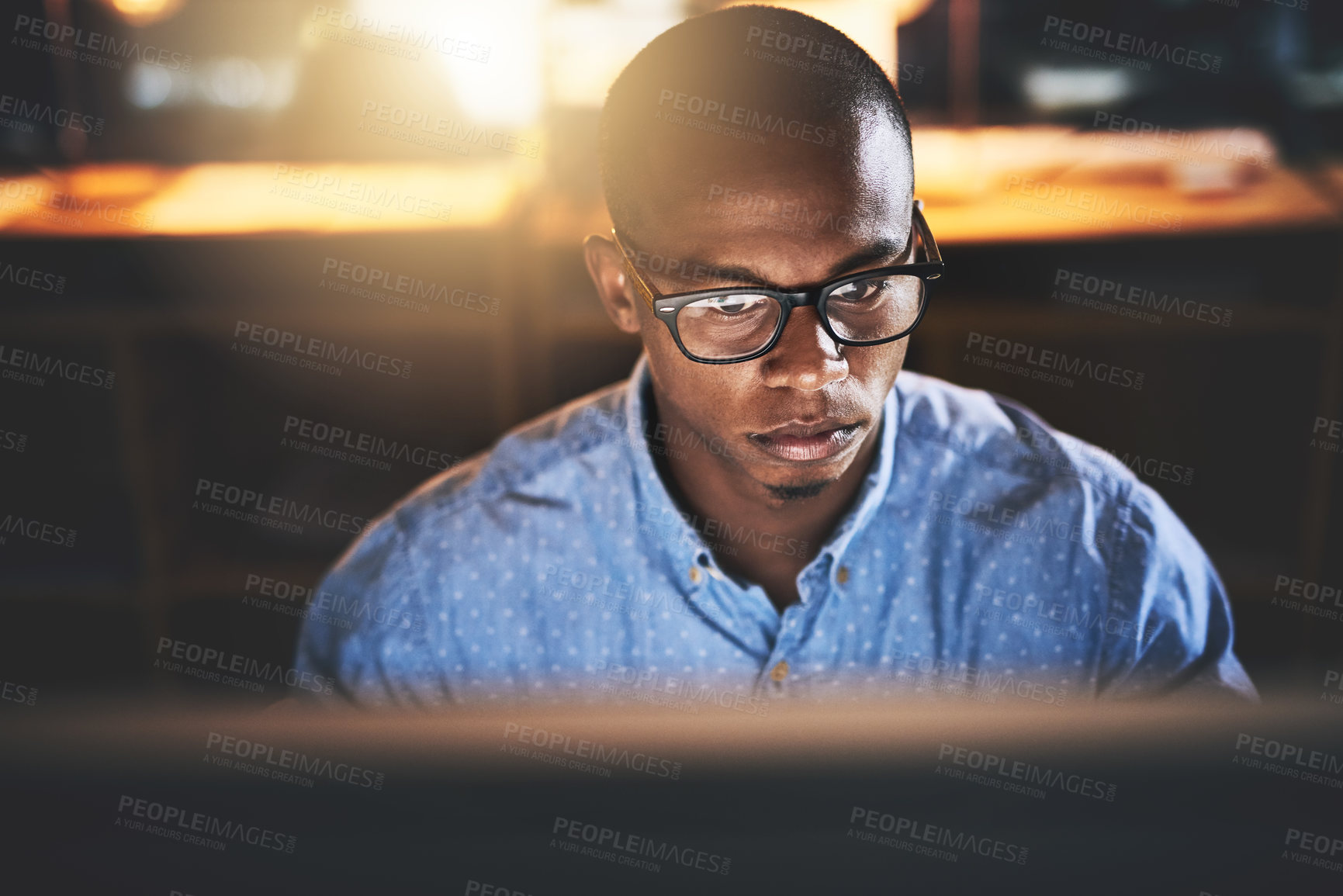 Buy stock photo Office, reading and business black man on computer for website, research and programming at night. Corporate, developer and worker online for software update, networking and working on web design