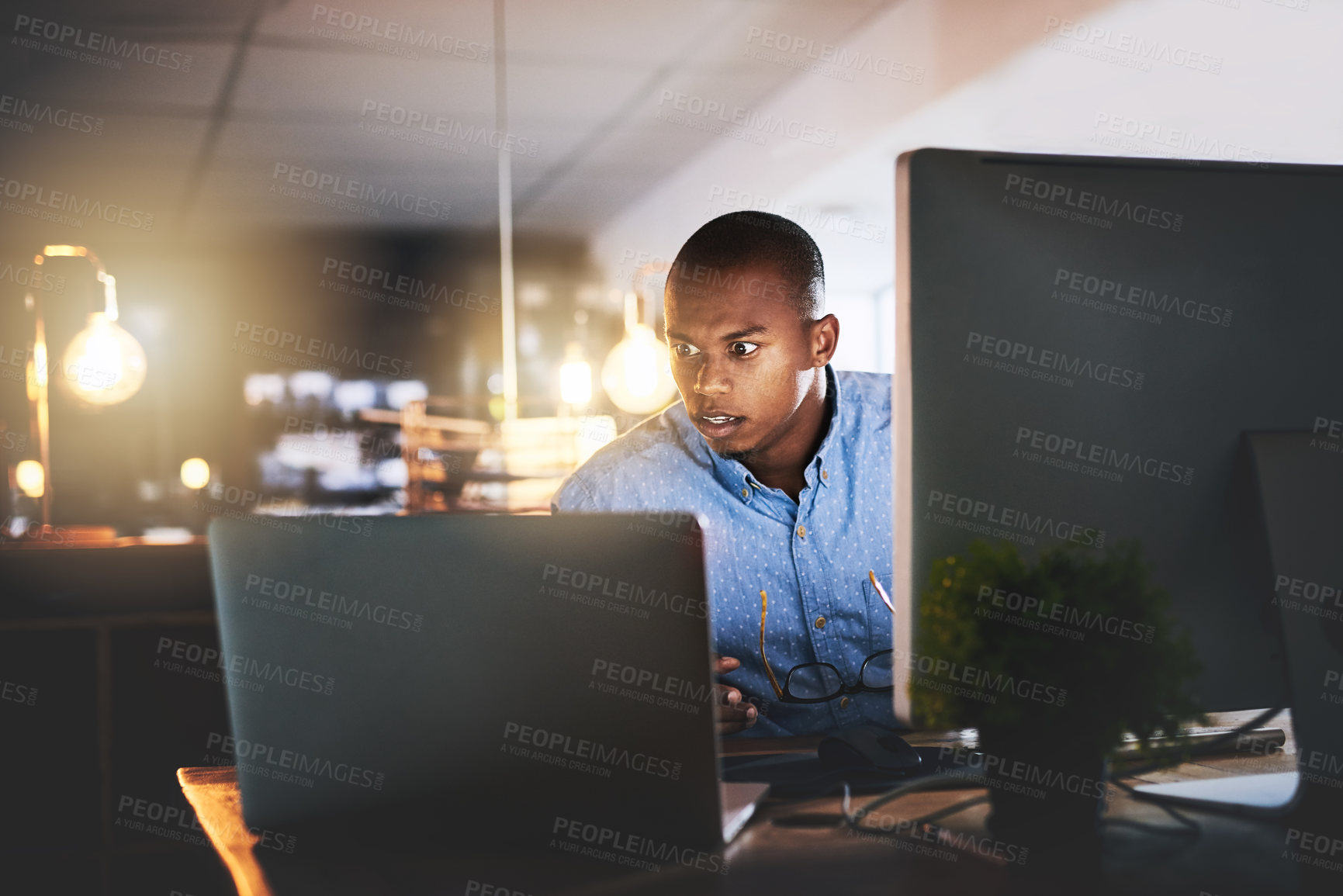 Buy stock photo Business stress, man working and computer at night with office typing and project web research. African male worker, technology and coding for website management for company with tech and anxiety