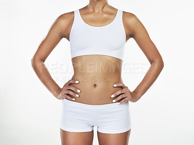 Buy stock photo Studio shot of a unrecognizable woman posing against a white background
