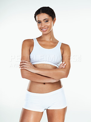 Buy stock photo Woman, arms folded and portrait in underwear for confidence or wellness and beauty in studio. Model girl, body care and pride for fitness with cosmetics for health, glow and shine by white background