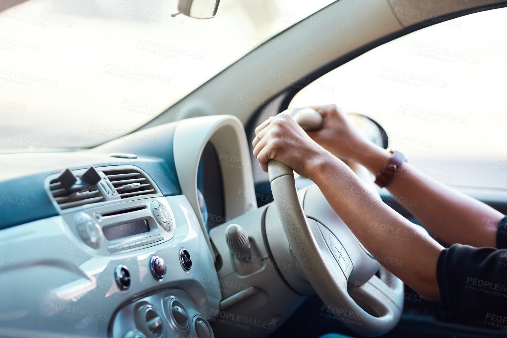 Buy stock photo Cropped shot of an unrecognizable businesswoman driving her car