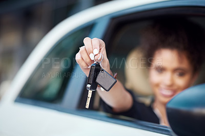 Buy stock photo Cropped portrait of an unrecognizable businesswoman holding up her car keys while sitting in her new car