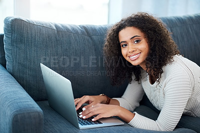 Buy stock photo Woman, laptop and typing portrait in home, relax and couch for social media or communication. Female person, search internet and sofa for news app or connection to subscription, check email and chat