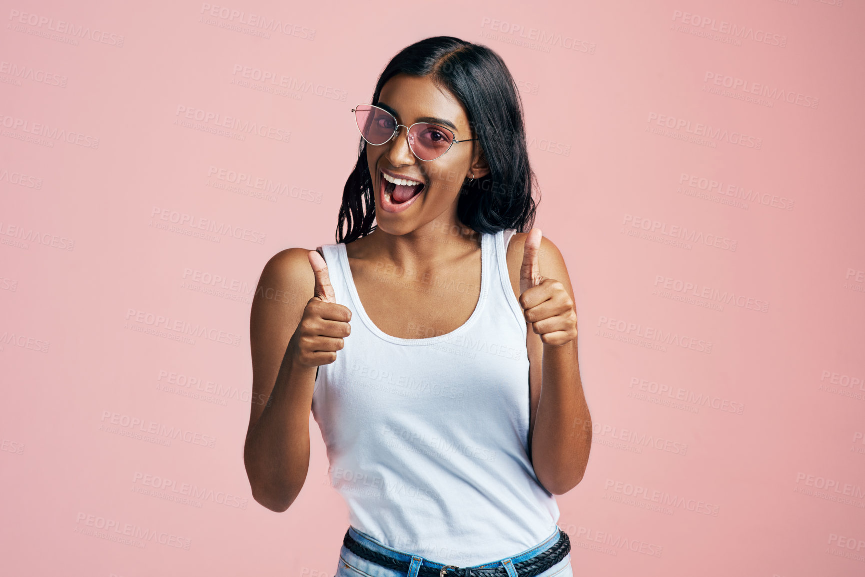 Buy stock photo Studio, Indian woman and thumbs up in portrait for agreement, success and support with mockup. Like, yes symbol and emoji reaction as feedback, opinion and vote by female model in pink background