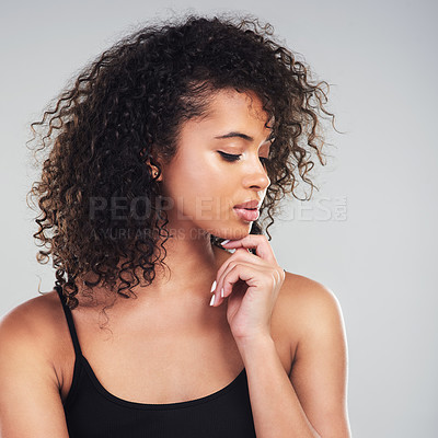 Buy stock photo Woman, curly beauty and hair care in studio, confidence and textures or glow on white background. Female person, hairstyle and cosmetics for shine or growth, dermatology and selfcare for treatment