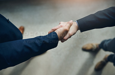 Buy stock photo Handshake, partnership and b2b with business men in the office for agreement, deal or company merger. Meeting, greeting or interview with people shaking hands at work to say thank you from above