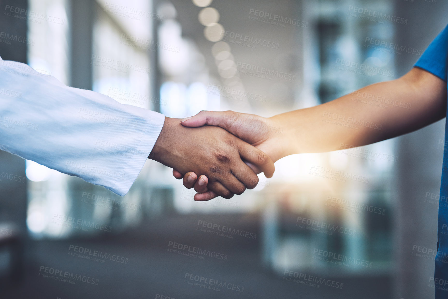 Buy stock photo Medical, people and handshake deal in hospital for partnership, support and onboarding introduction meeting. Healthcare, specialist and agreement, teamwork and promotion for clinic treatment plan