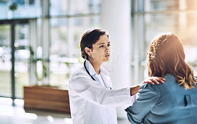 Buy stock photo Cropped shot of a female doctor talking to a patient