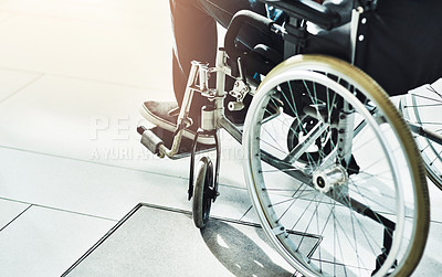 Buy stock photo Closeup shot of an unrecognizable man sitting in a wheelchair