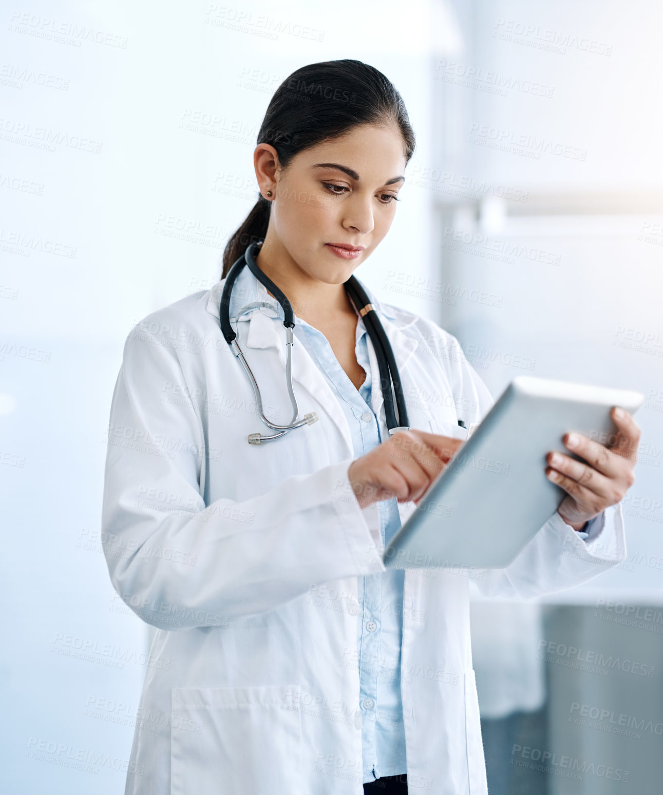 Buy stock photo Woman, doctor or research with tablet for medical history, telehealth or service at hospital. Young, female person or healthcare employee with technology for online browsing or new medicine at clinic