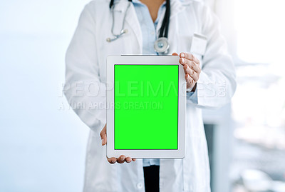 Buy stock photo Closeup shot of an unrecognizable doctor holding a digital tablet with a chroma key screen