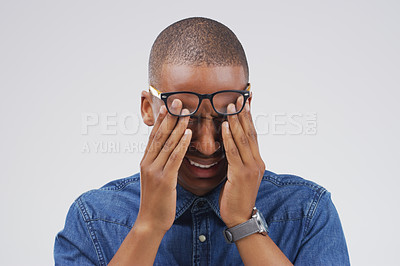 Buy stock photo Crying, scared or sad black man in studio with depression, crisis or broken heart on grey background. Pain, sorrow and emotional guy frustrated by stress, anxiety and grief with loss and bad news 