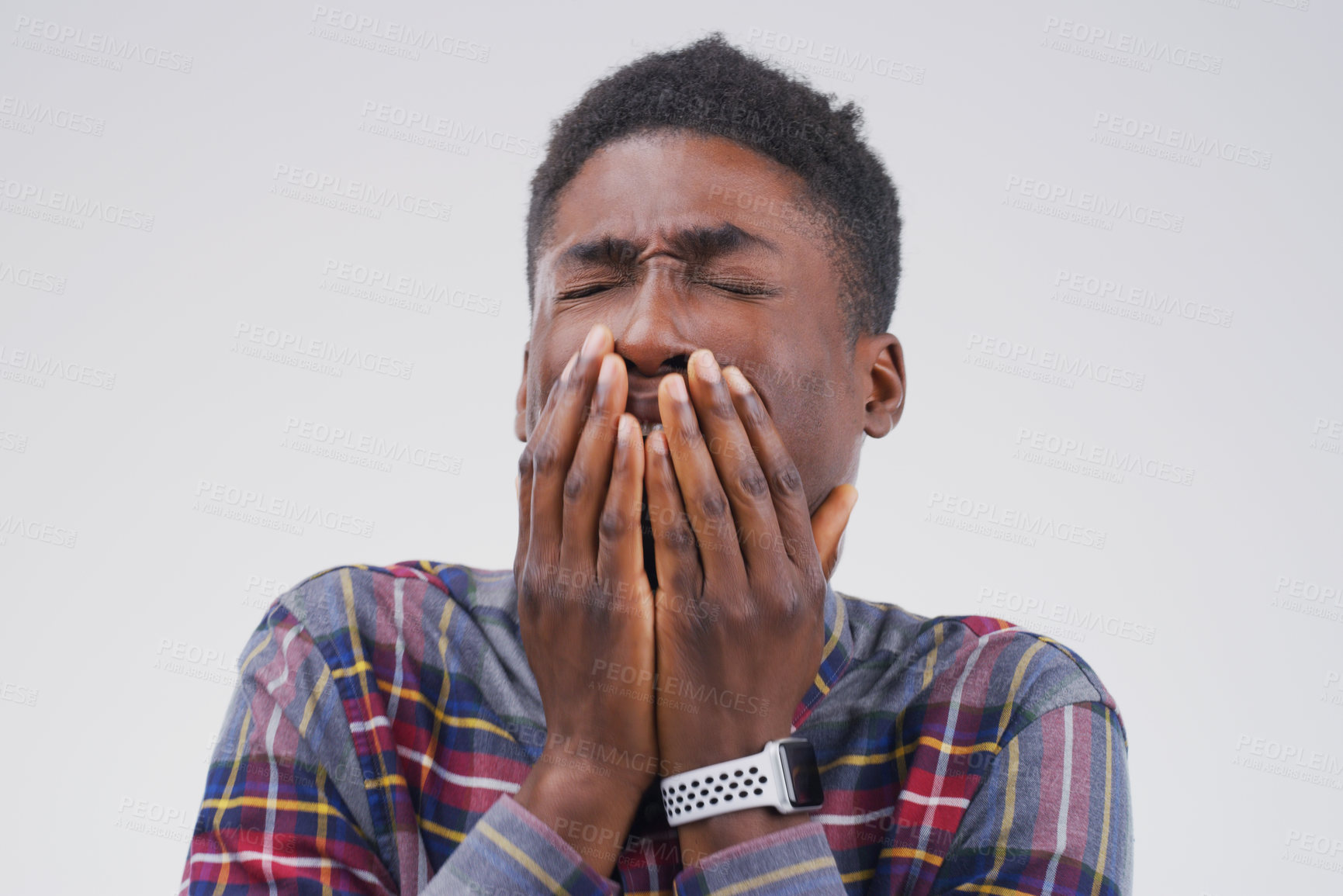 Buy stock photo Black man, crying and hurt in studio for drama, horror and scared on white background. Shocked, alarm and male person with hands on face for omg, shock and reaction to scare or story