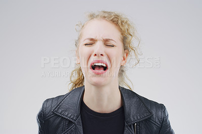 Buy stock photo Crying, screaming and sad woman in studio with depression, crisis and stress on grey background. Pain, sorrow and emotional female person frustrated by worry, anxiety or grief with loss or bad news