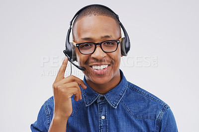 Buy stock photo African man, portrait and white background with headphones for customer service or call center, smile for communication. Male person, studio and microphone with happiness for chat or telemarketing