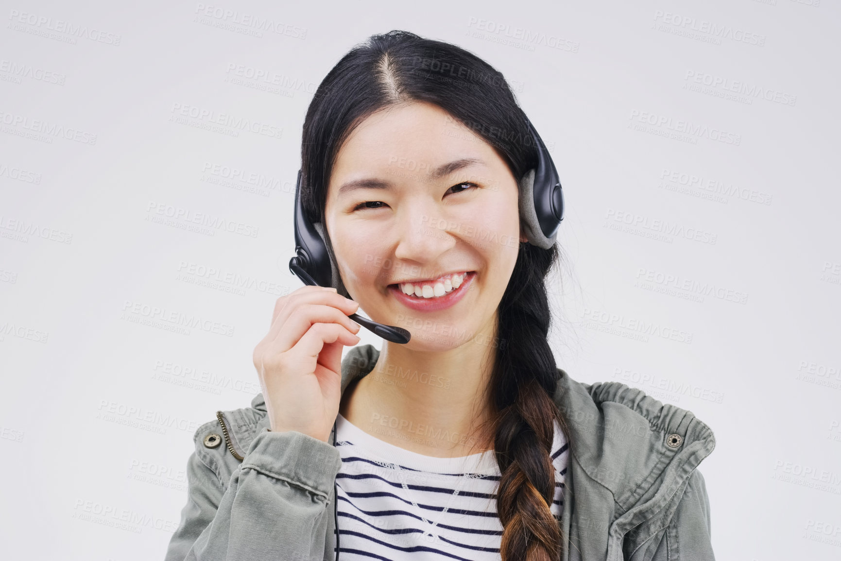 Buy stock photo Portrait, asian woman and headset for call centre, communication and smile by studio backdrop. Female person, happiness and microphone for talking, crm agent and consultant by white background
