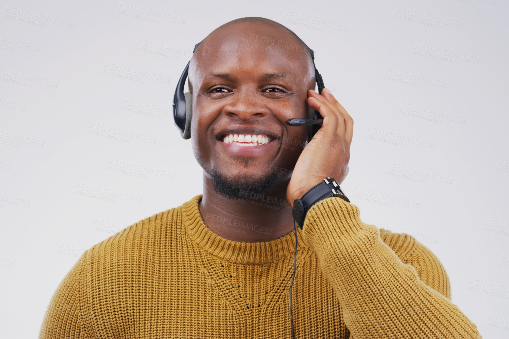 Buy stock photo African man, smile and studio with headphones for customer service or call center, smile for communication. Male person, white background and microphone with happiness for chat or telemarketing