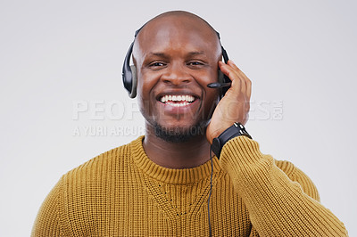 Buy stock photo African man, portrait and studio with headset for customer service or call center, smile for communication. Male person, white background and microphone with happiness for chat or telemarketing