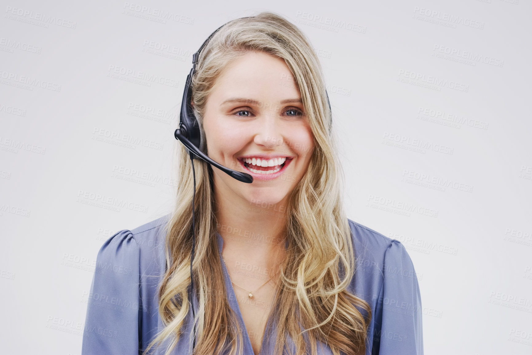 Buy stock photo Studio shot of an attractive young female customer service representative wearing a headset against a grey background