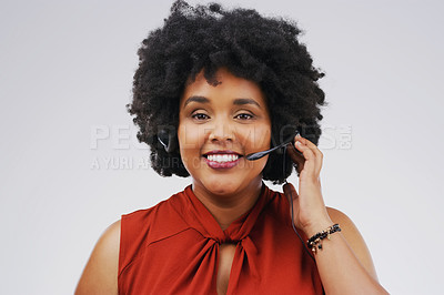 Buy stock photo Studio portrait of an attractive young female customer service representative wearing a headset against a grey background