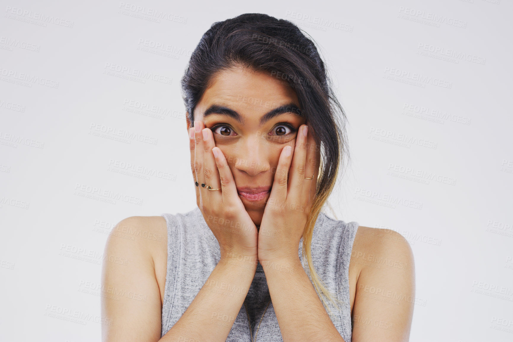 Buy stock photo Surprised, portrait and hispanic woman in studio for gossip, drama or announcement on white background. Wow, covering face and shocked female person for fake news, wtf reaction or omg with mockup