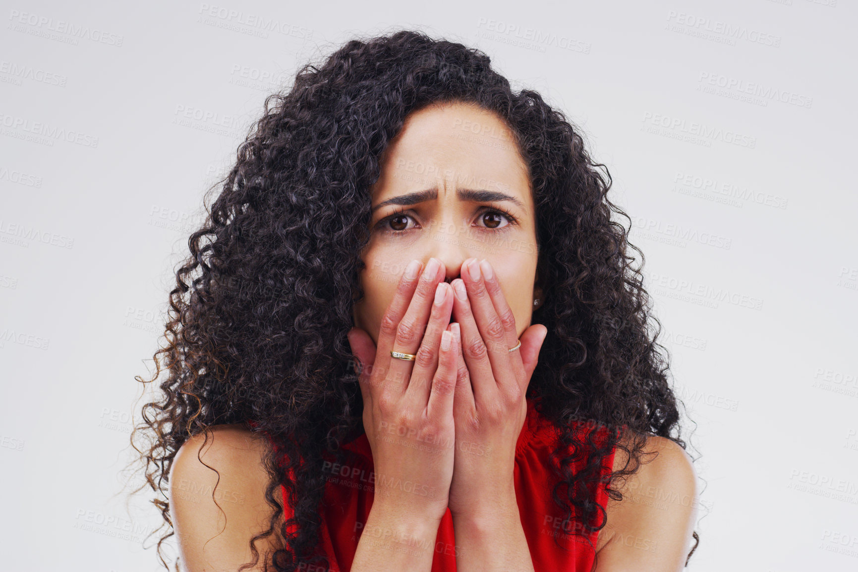 Buy stock photo Frown, woman and portrait in studio for drama, horror and secret on white background. Shocked, alarm and female person with hands on face for wow, omg and reaction to meme or story in Puerto rico